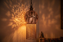 Load image into Gallery viewer, Decorative hanging light fixture with intricate design and tassels on a white background